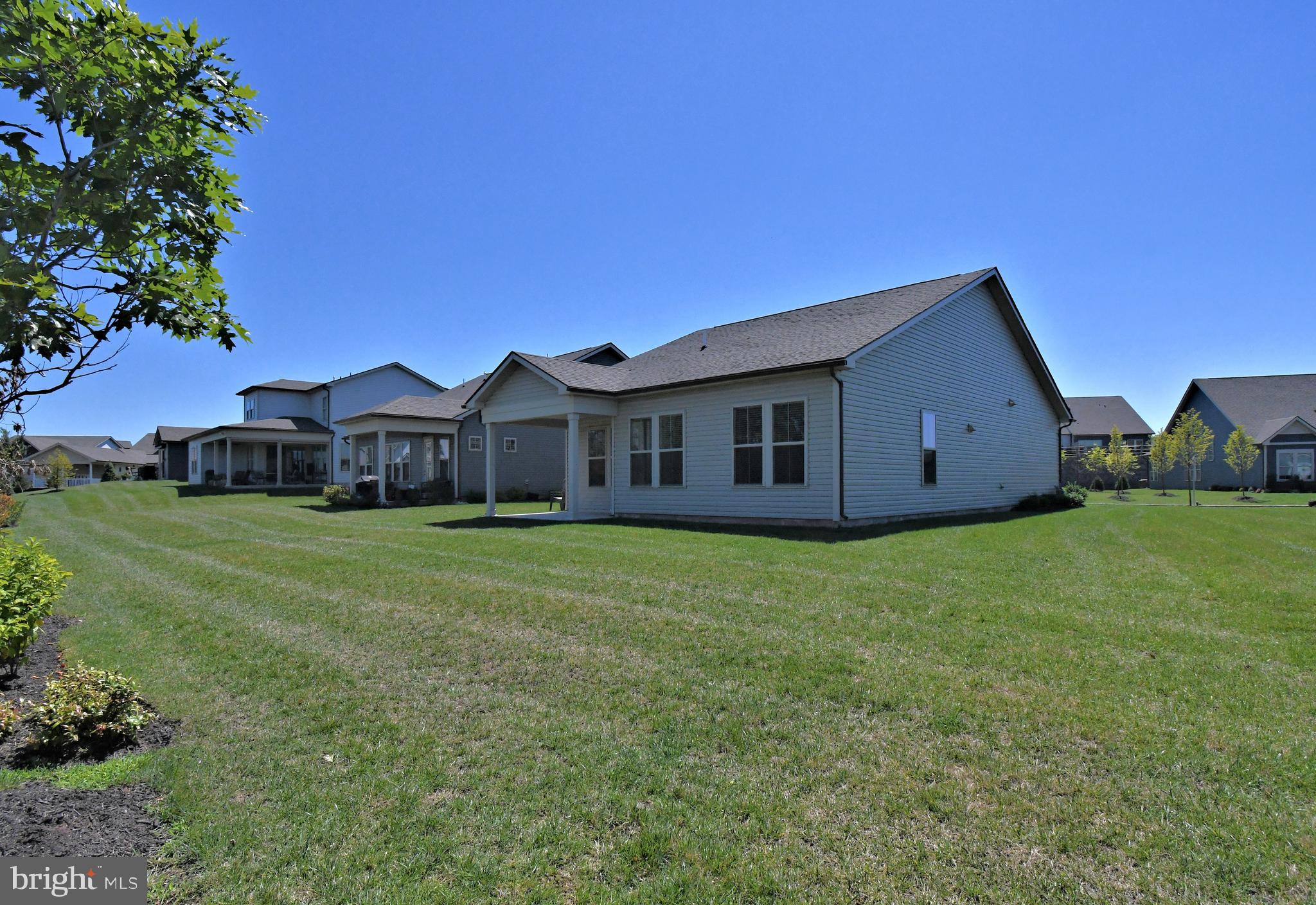 1024 Wright Street Hatfield, PA 19440 - Photo 29 of 68 a view of a house with a big yard potted plants and large tree