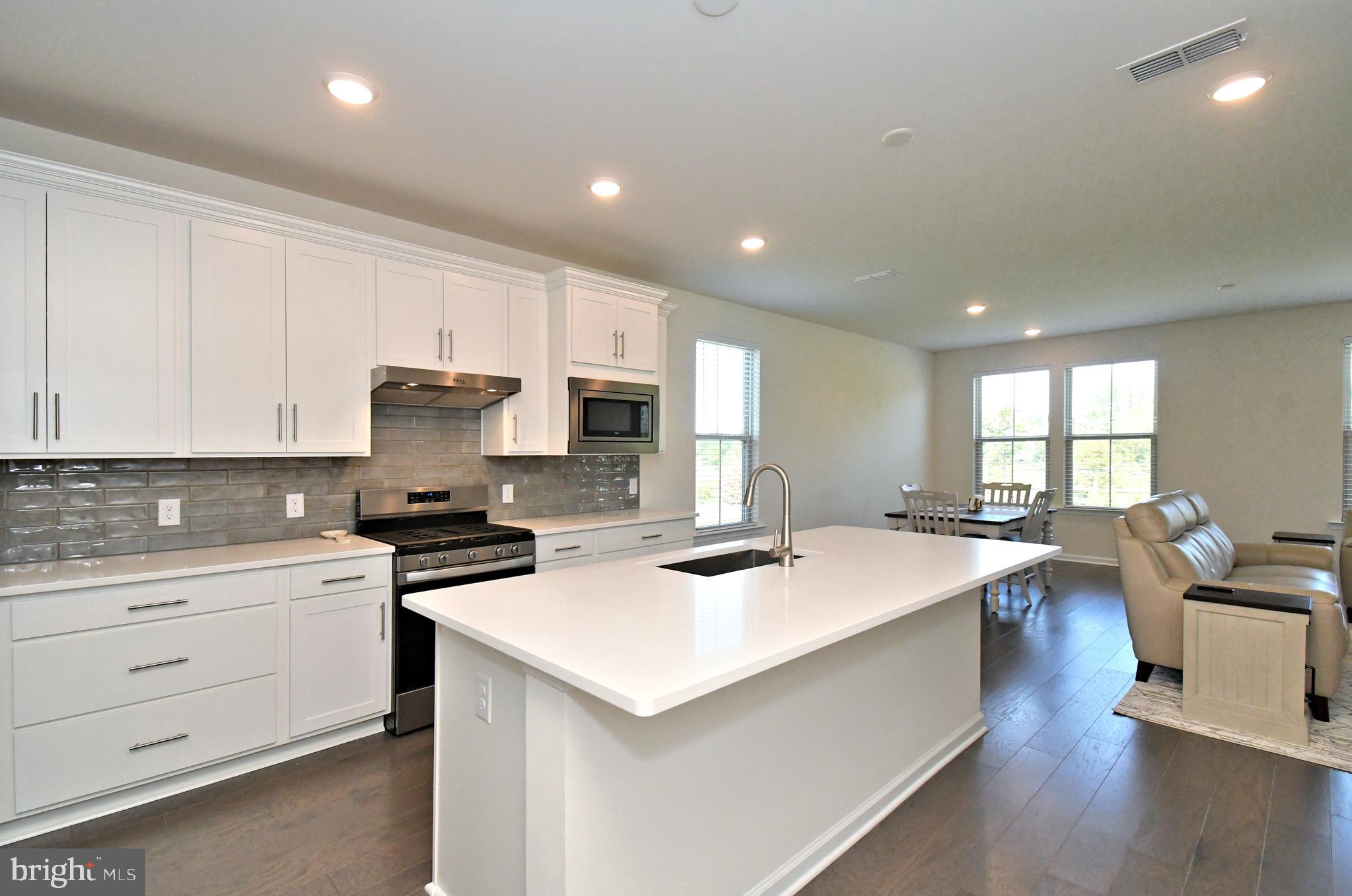 1024 Wright Street Hatfield, PA 19440 - Photo 5 of 68 a kitchen with a sink a stove a refrigerator and cabinets
