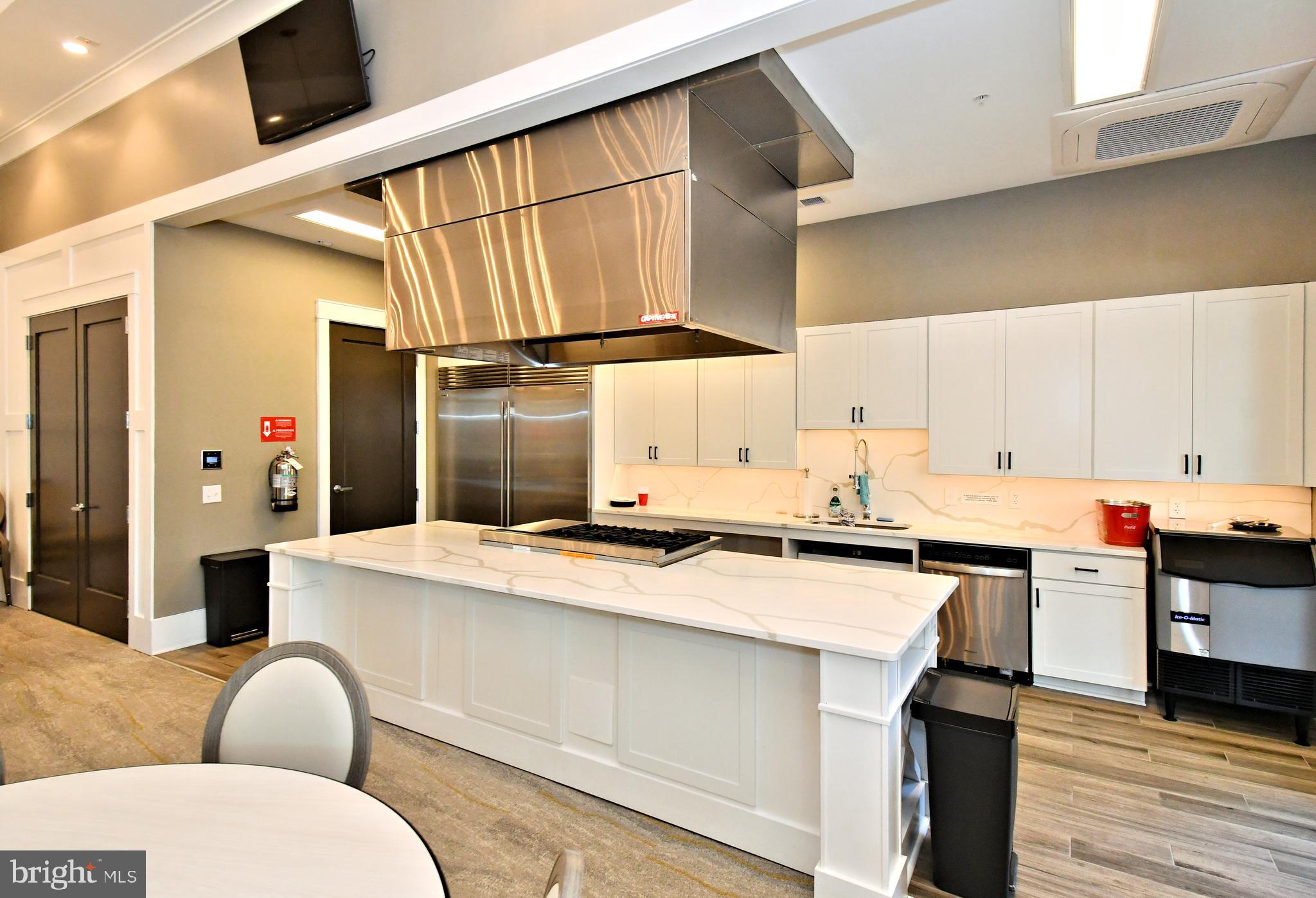 1024 Wright Street Hatfield, PA 19440 - Photo 53 of 68 a kitchen with stainless steel appliances granite countertop a sink and cabinets