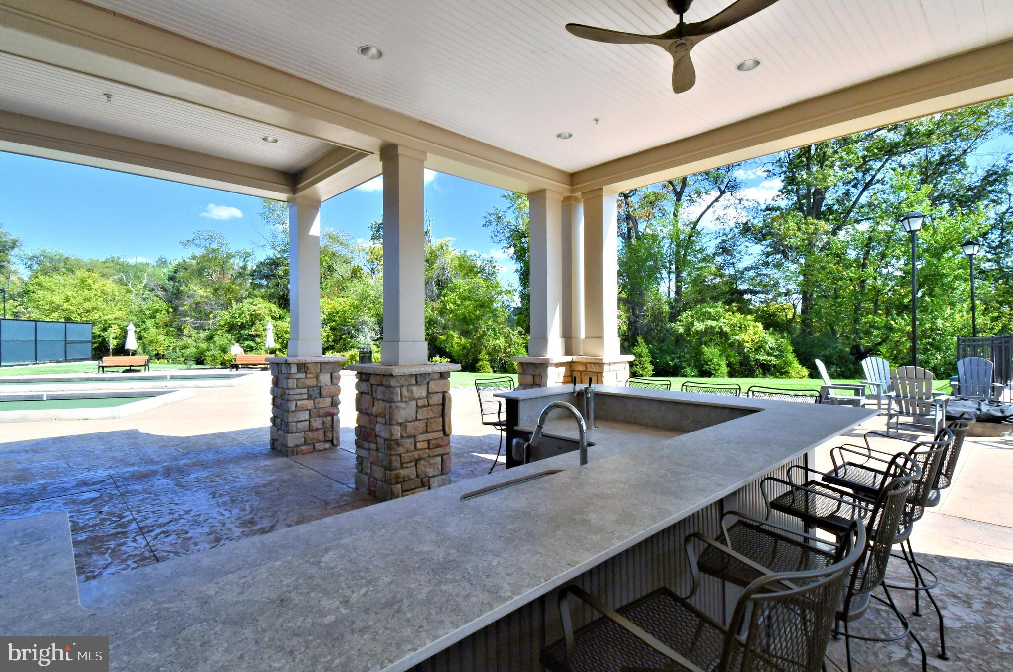 1024 Wright Street Hatfield, PA 19440 - Photo 60 of 68 a view of a patio with a table chairs and backyard