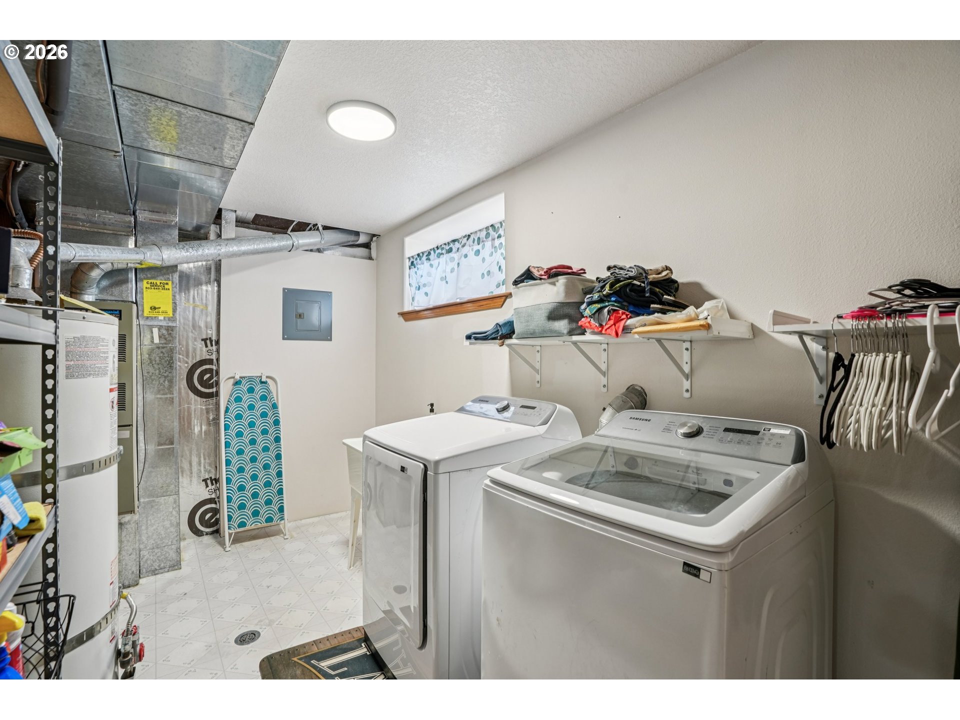 128 North 31st Avenue Cornelius, OR 97113 - Photo 22 of 32 a utility room with dryer and washer