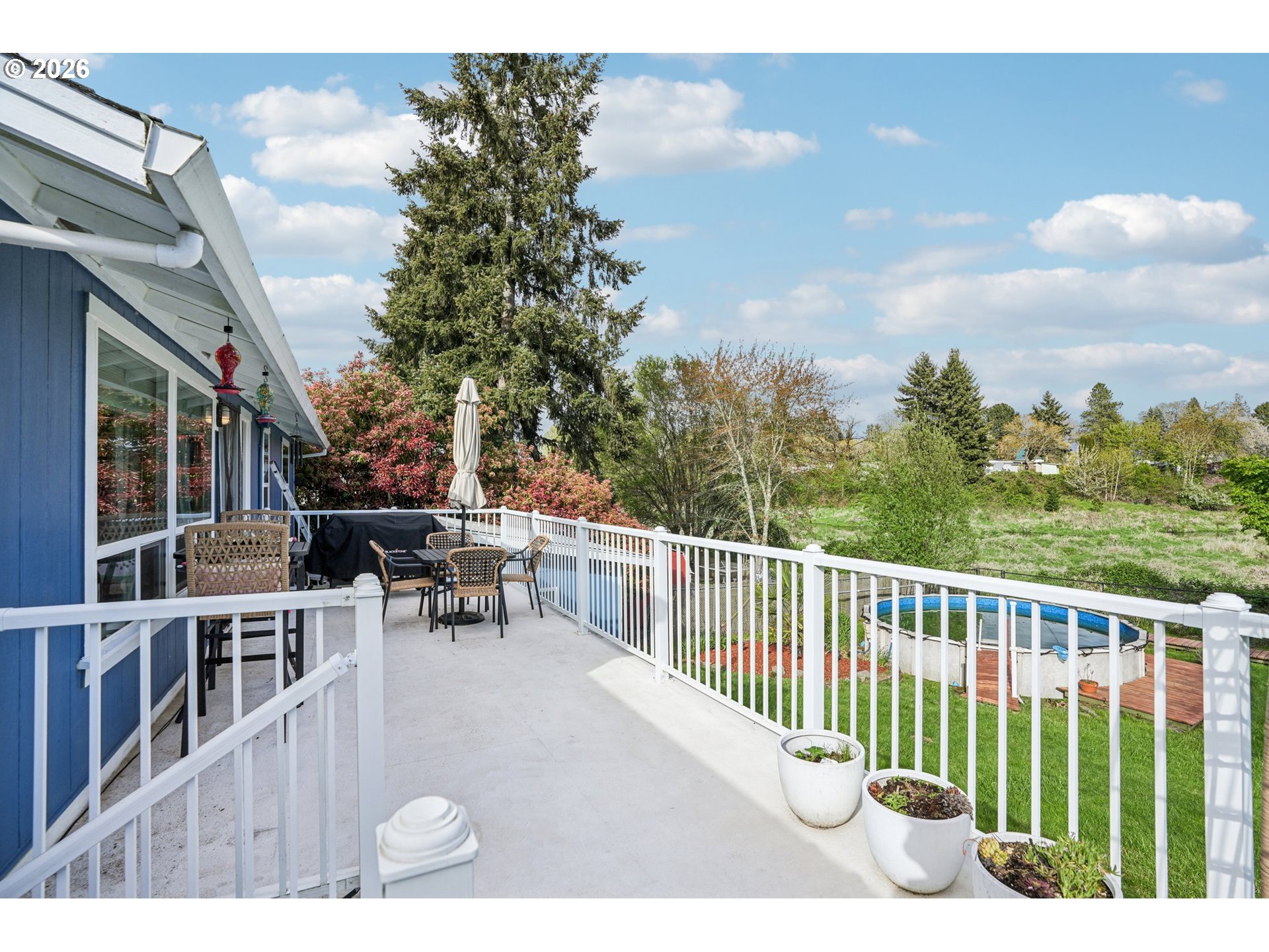 128 North 31st Avenue Cornelius, OR 97113 - Photo 24 of 32 a view of a chairs and tables in the balcony