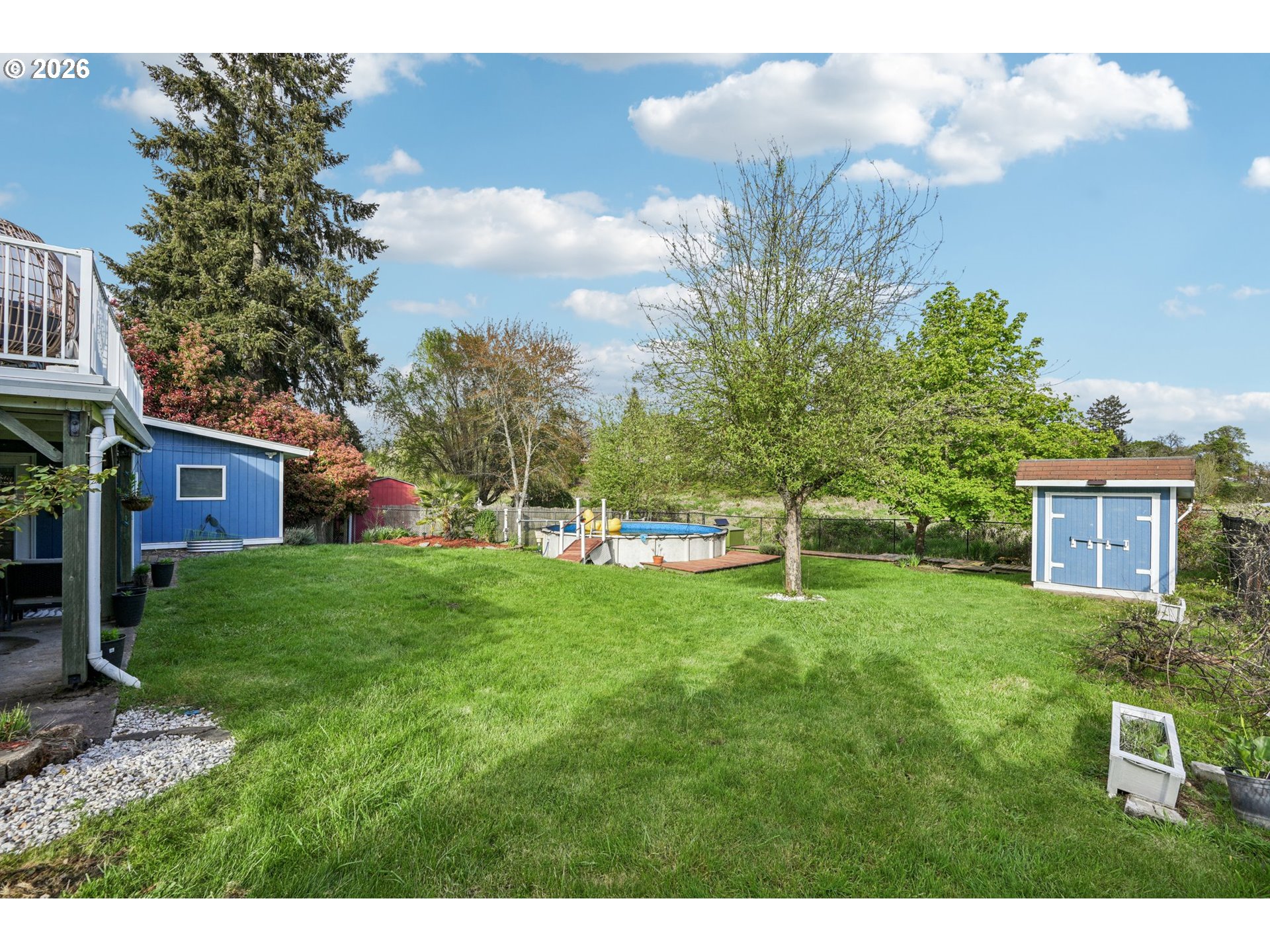 128 North 31st Avenue Cornelius, OR 97113 - Photo 26 of 32 a backyard of a house with table and chairs