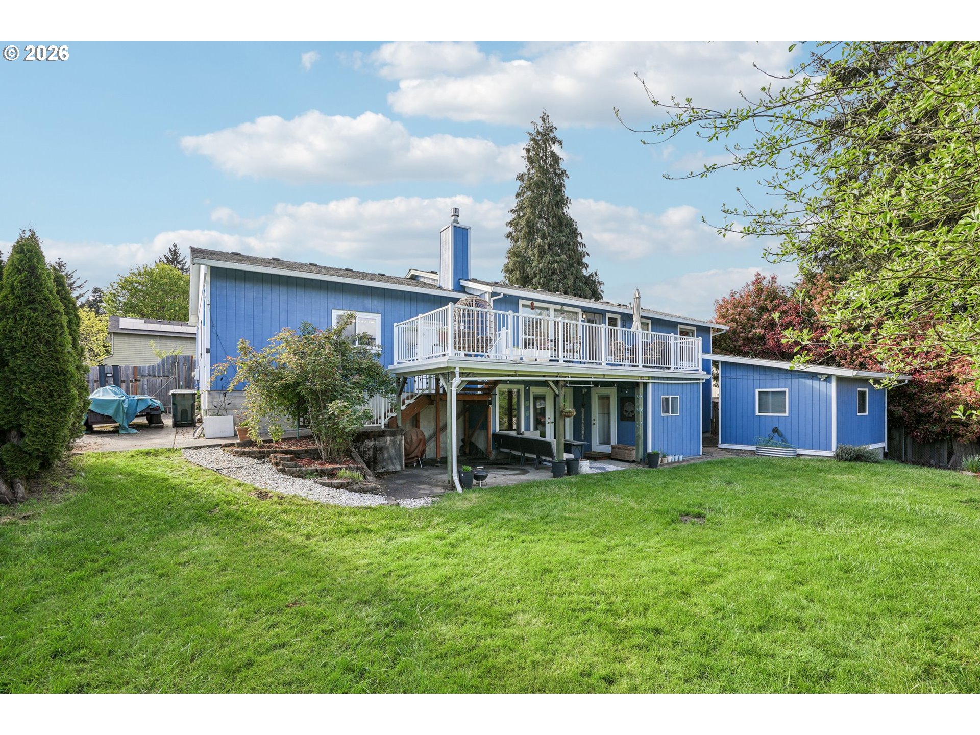 128 North 31st Avenue Cornelius, OR 97113 - Photo 27 of 32 a view of a house with a yard and sitting area