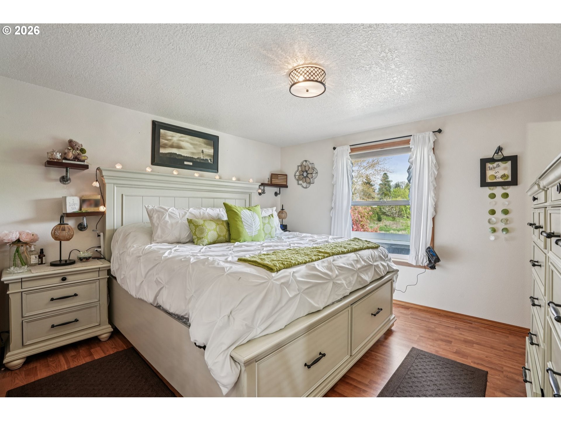 128 North 31st Avenue Cornelius, OR 97113 - Photo 10 of 32 a bedroom with a bed and a dresser