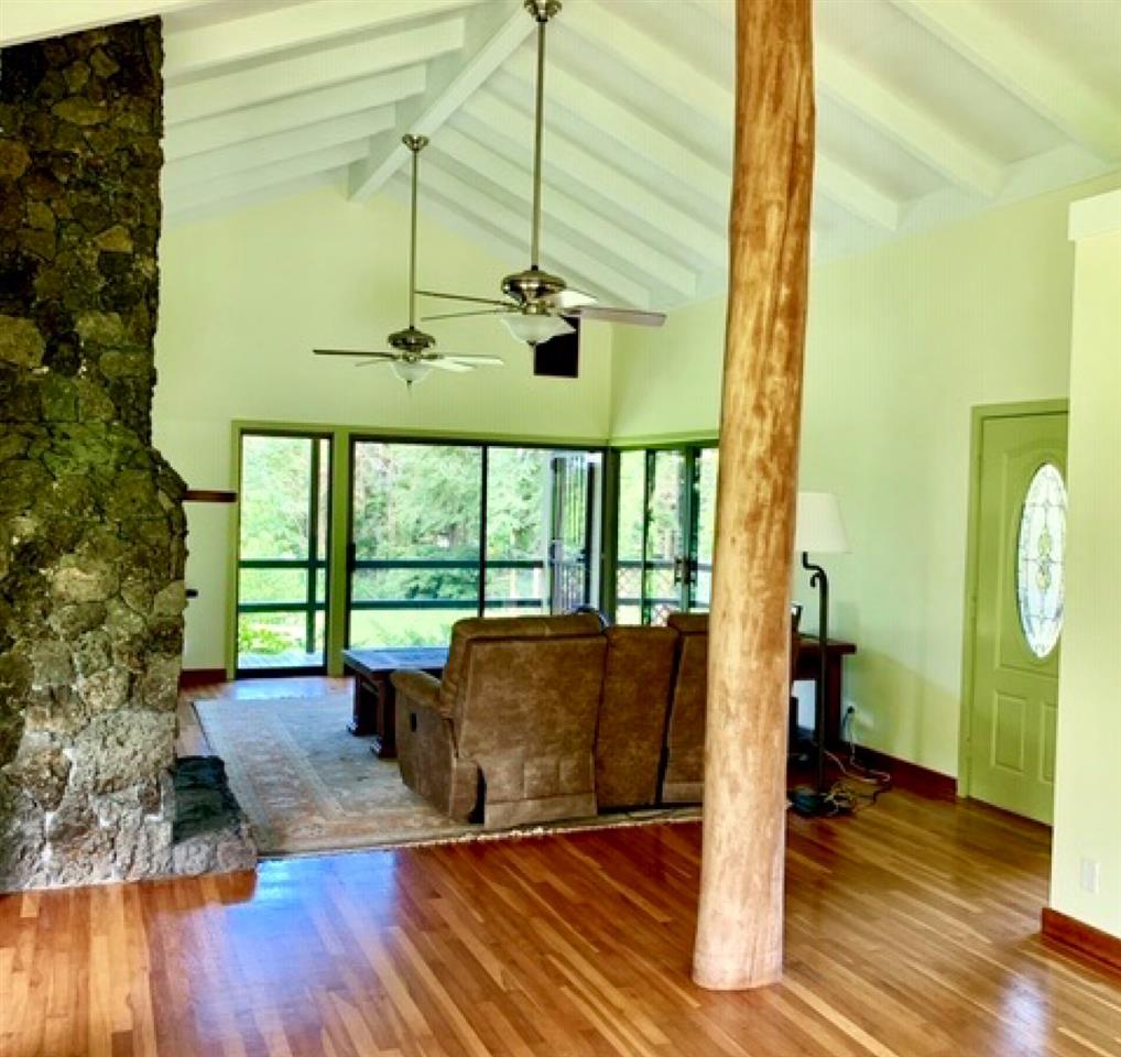 60 Kalo Road Hana, HI 96713 - Photo 13 of 30 wooden floor in an empty room with a window