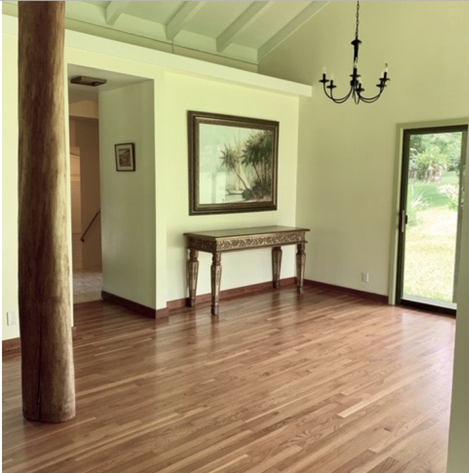 60 Kalo Road Hana, HI 96713 - Photo 14 of 30 a view of an empty room with wooden floor and a window