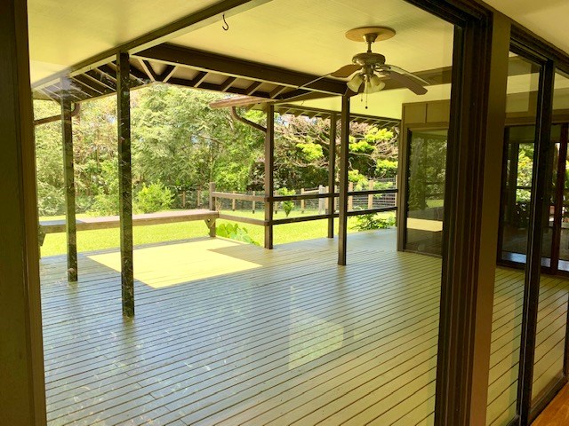 60 Kalo Road Hana, HI 96713 - Photo 15 of 30 a view of an empty room with wooden floor and a window