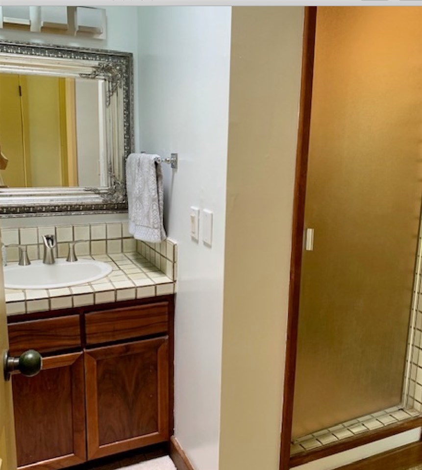60 Kalo Road Hana, HI 96713 - Photo 23 of 30 a bathroom with a sink and a mirror