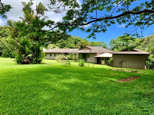 60 Kalo Road Hana, HI 96713 - Photo 3 of 30 a front view of a house with a yard