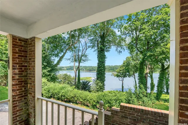 a view of a garden from a balcony