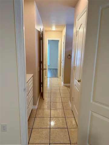 a bathroom with a mirror and a shower