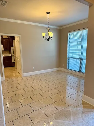 a view of a livingroom with wooden floor