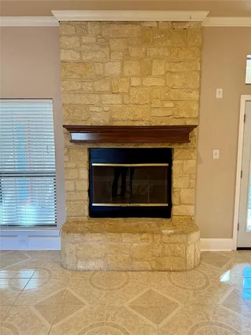 a living room with a fireplace