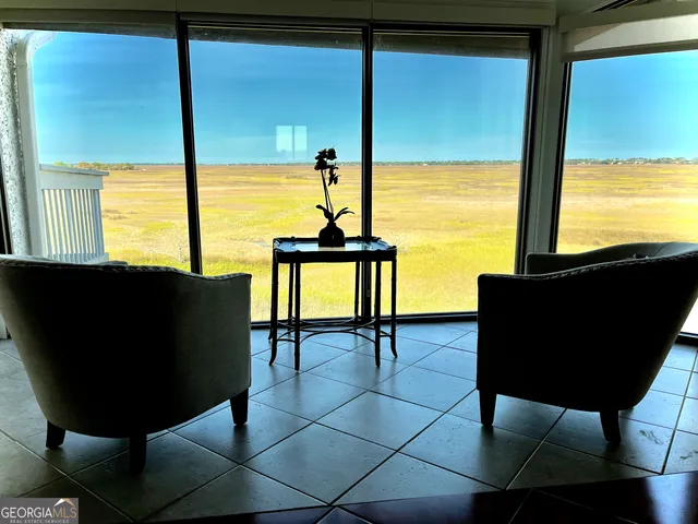 a bathroom with a sink and a window