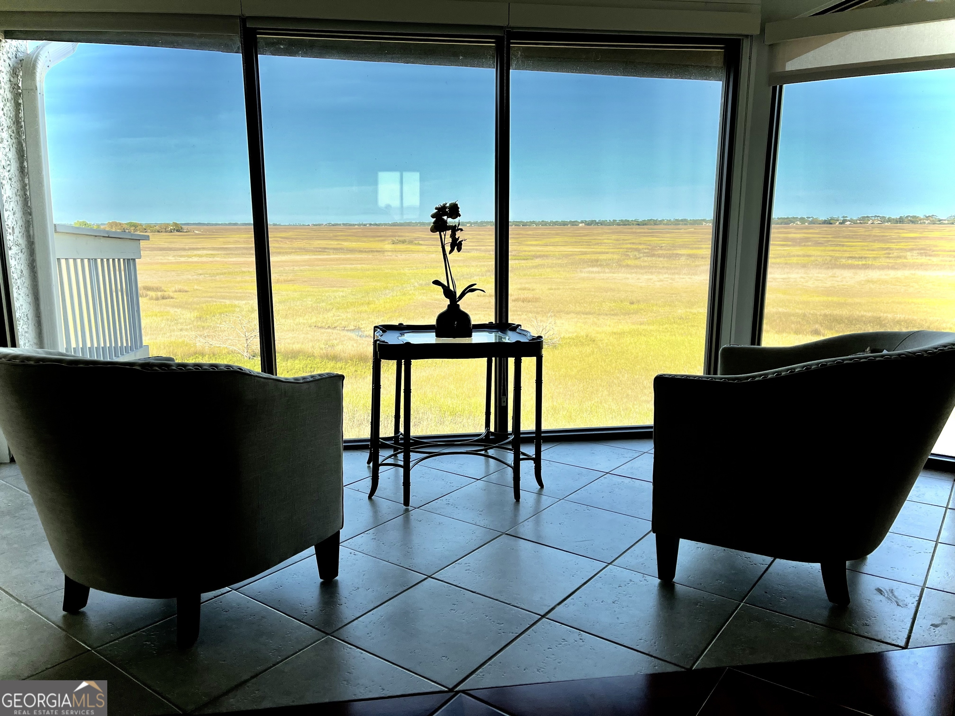 372 Moss Oak Circle St. Simons, GA 31522 - Photo 15 of 44 a view of a living room with furniture and window
