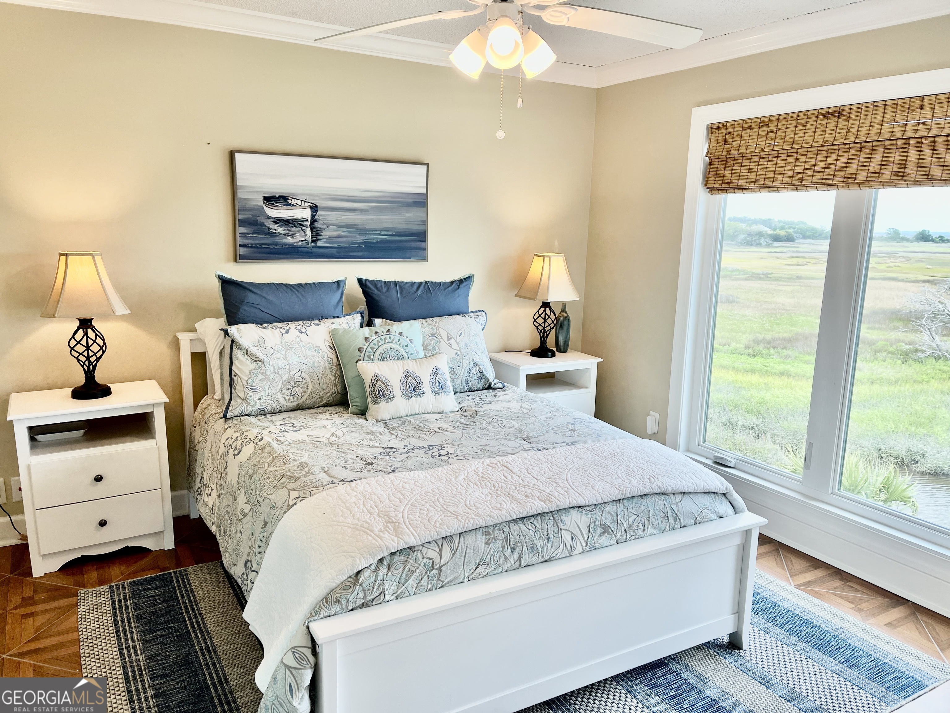 372 Moss Oak Circle St. Simons, GA 31522 - Photo 20 of 44 a bedroom with a bed and window