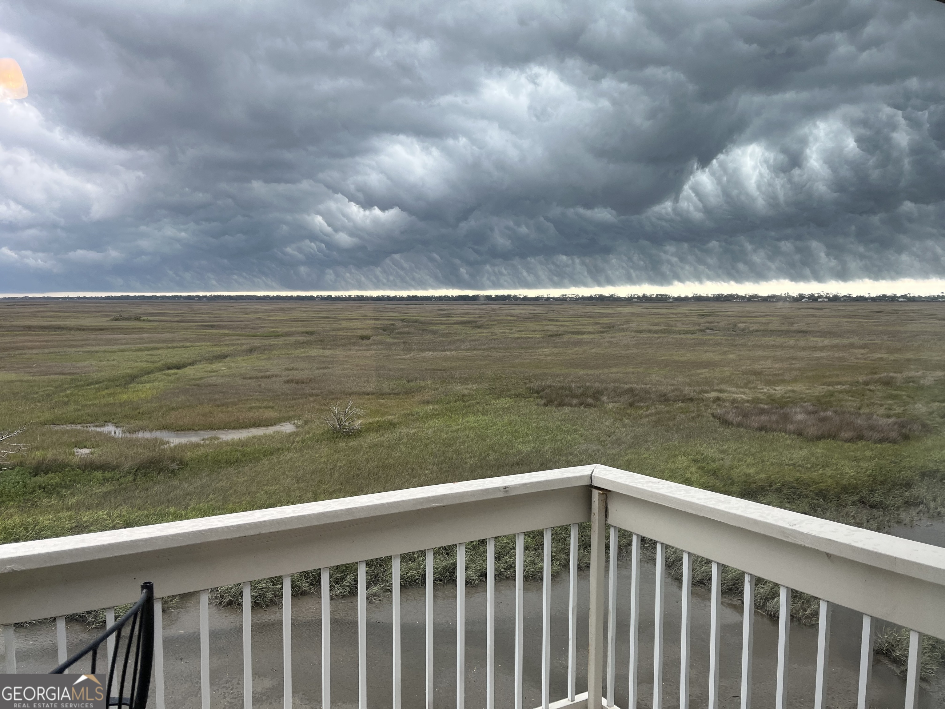372 Moss Oak Circle St. Simons, GA 31522 - Photo 29 of 44 a terrace view with lake view