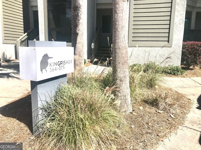 a view of the house with a swimming pool