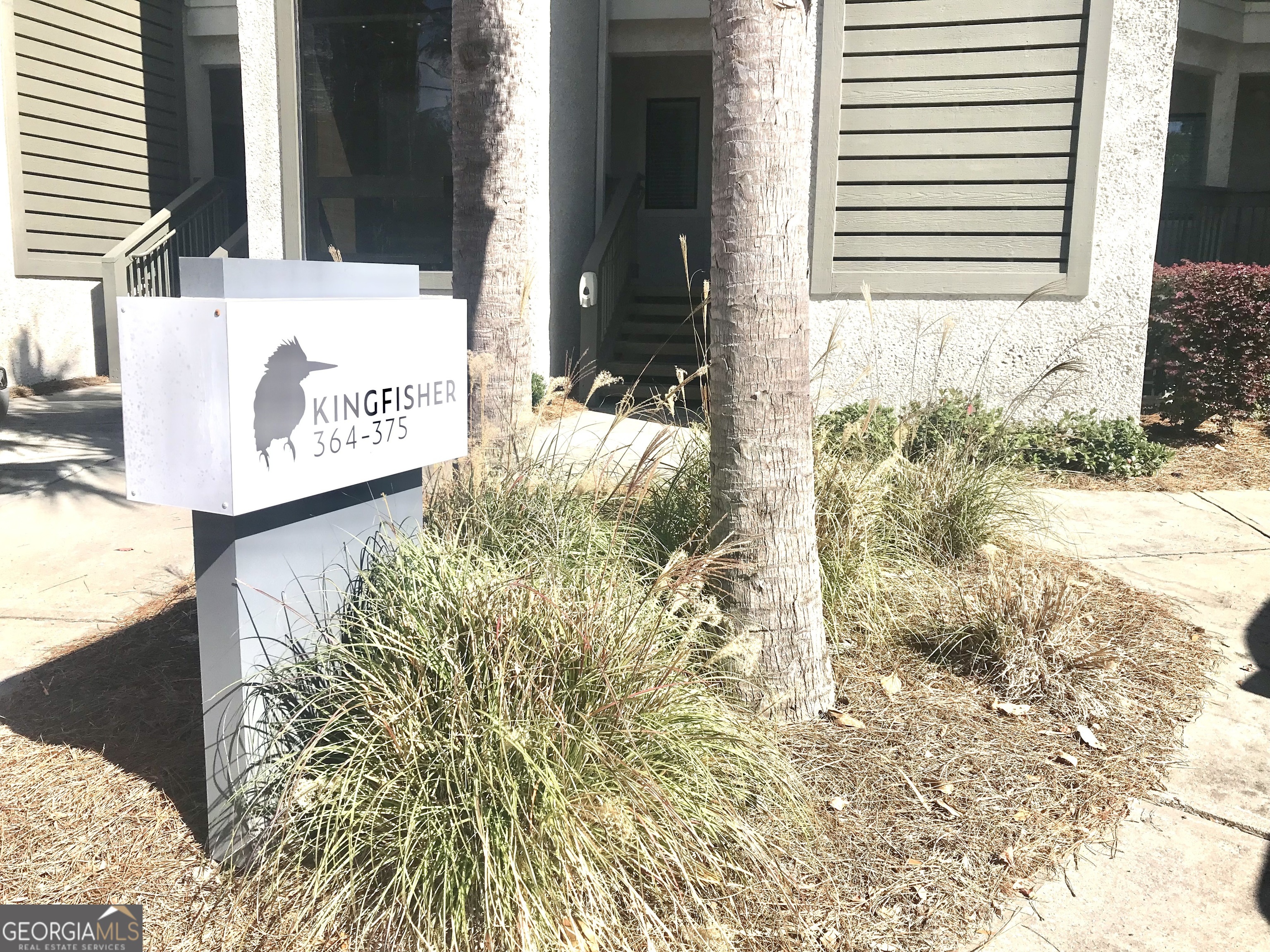 372 Moss Oak Circle St. Simons, GA 31522 - Photo 31 of 44 a sign that is on the side of a road