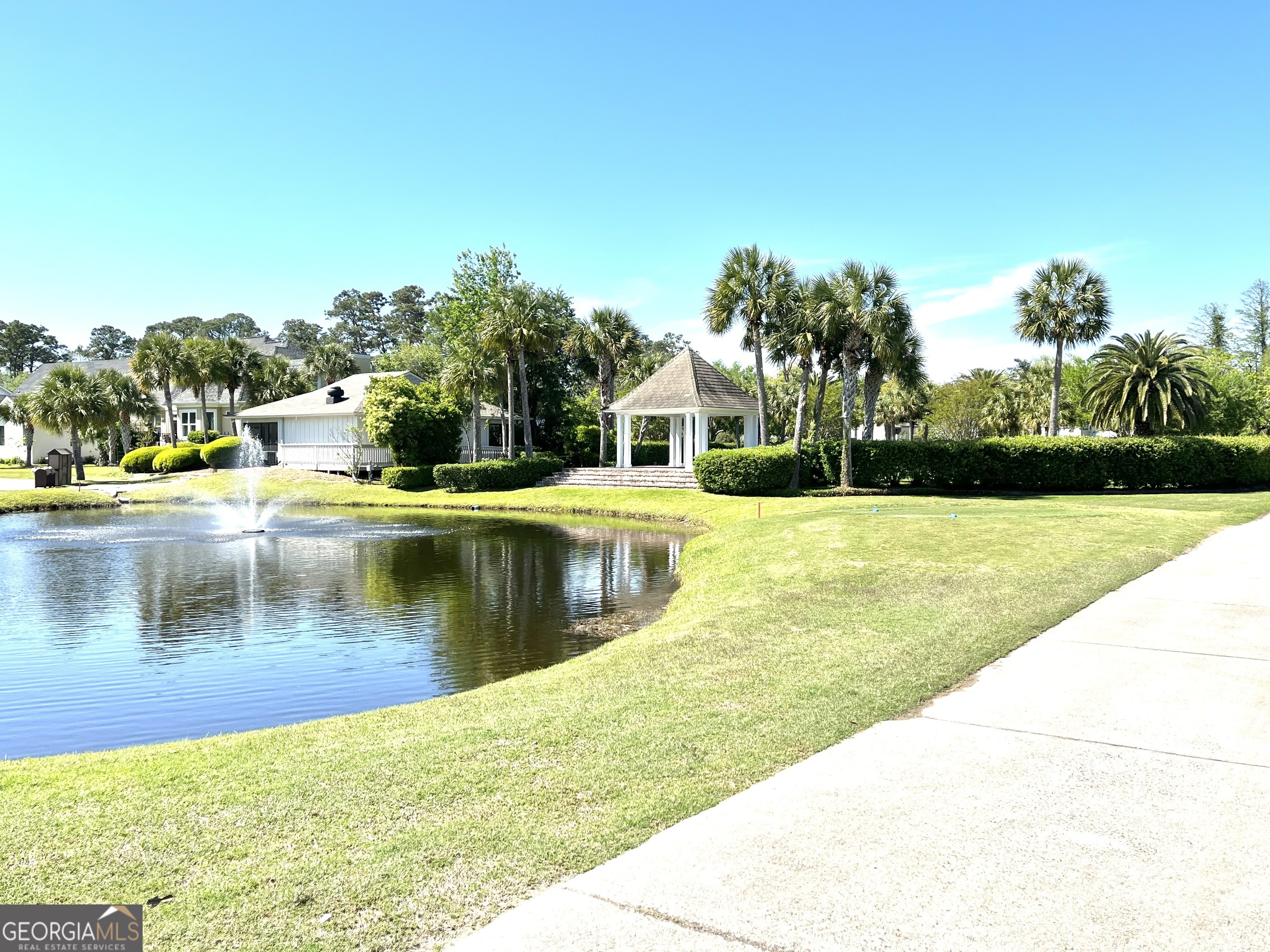 372 Moss Oak Circle St. Simons, GA 31522 - Photo 35 of 44 a view of a lake with houses