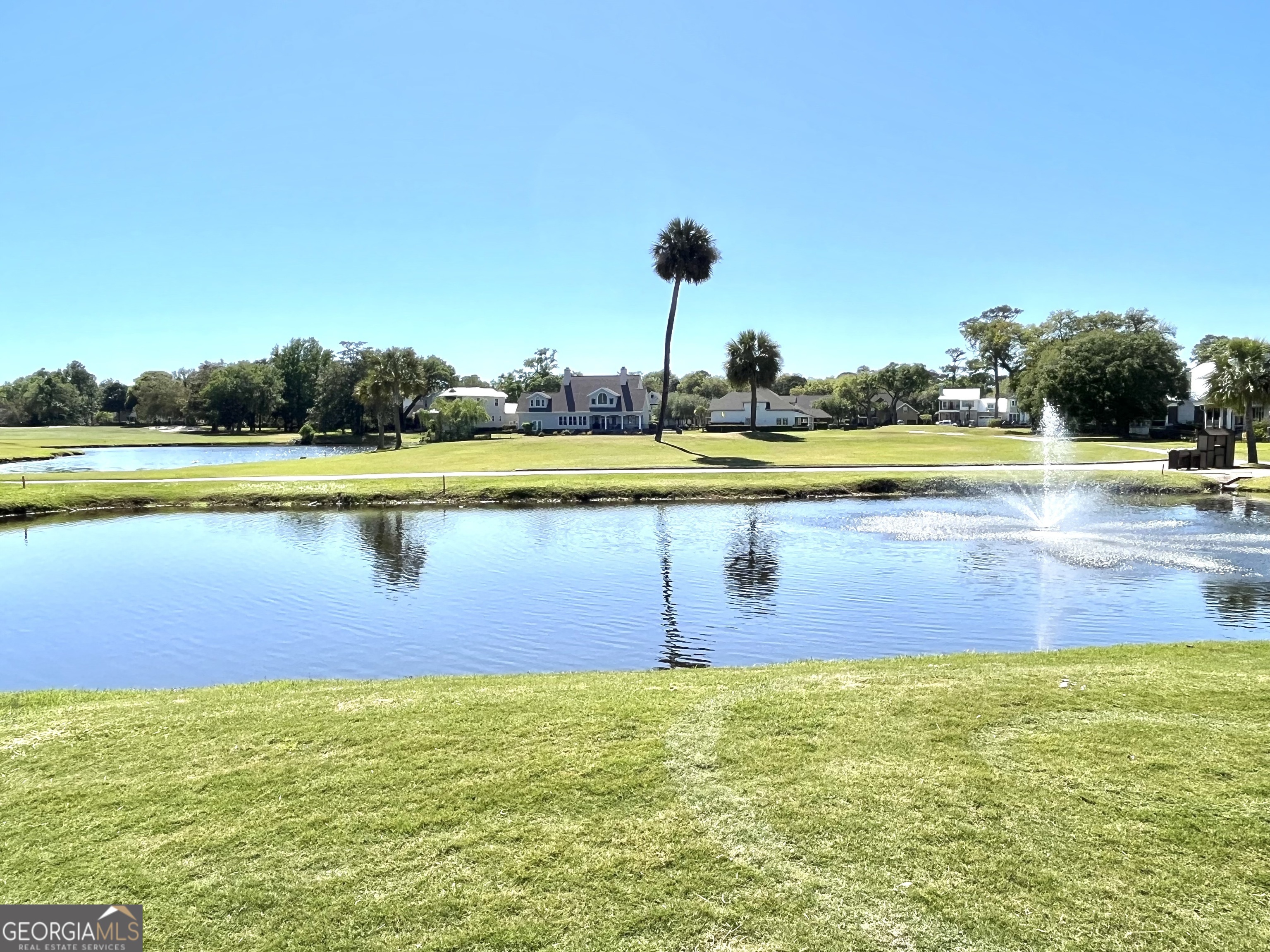372 Moss Oak Circle St. Simons, GA 31522 - Photo 36 of 44 a view of an outdoor space and swimming pool