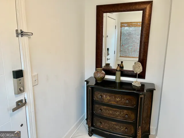 a view of ocean from balcony with furniture