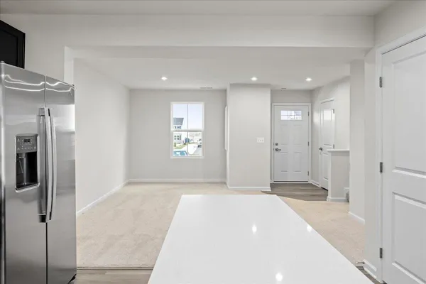 a view of an empty room and window