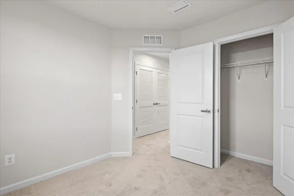 a bathroom with a mirror and a shower
