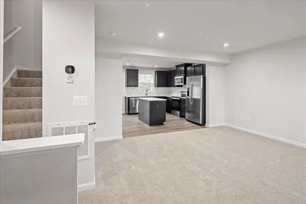 a view of a kitchen with a sink