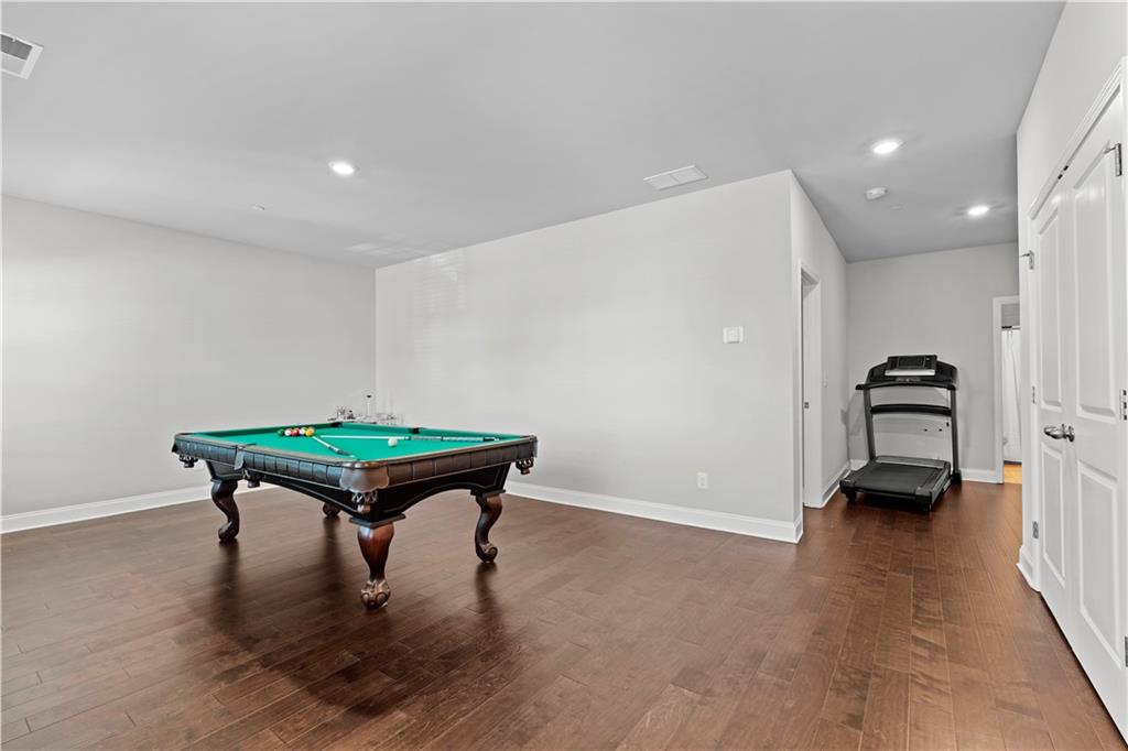 1030 Shy Lane Marietta, GA 30060 - Photo 38 of 50 a room with furniture and a wooden floor