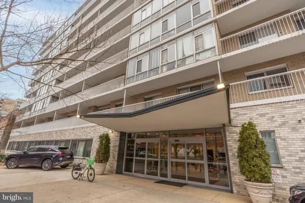a bike parked in front of a building