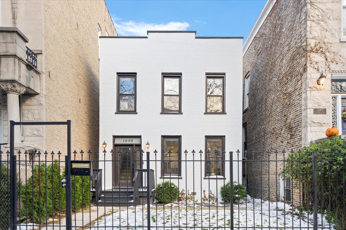 a front view of a building with glass windows