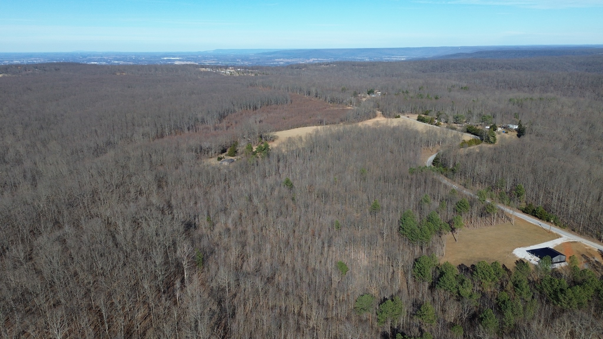 0 Old Shook Road Belvidere, TN 37306 - Photo 3 of 13 a view of a dry yard with wooden fence