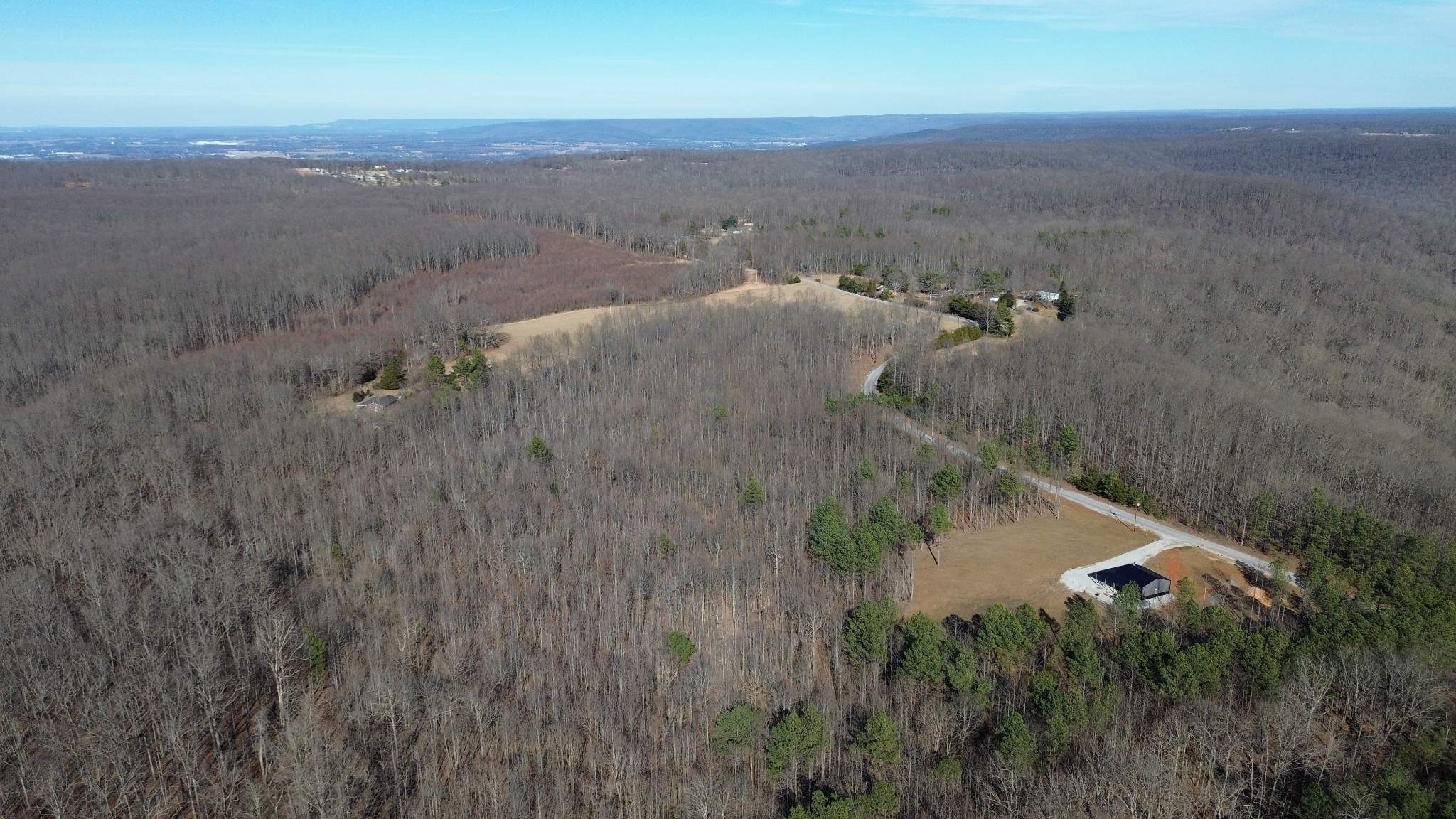 0 Old Shook Road Belvidere, TN 37306 - Photo 10 of 13 a view of a dry yard with wooden fence