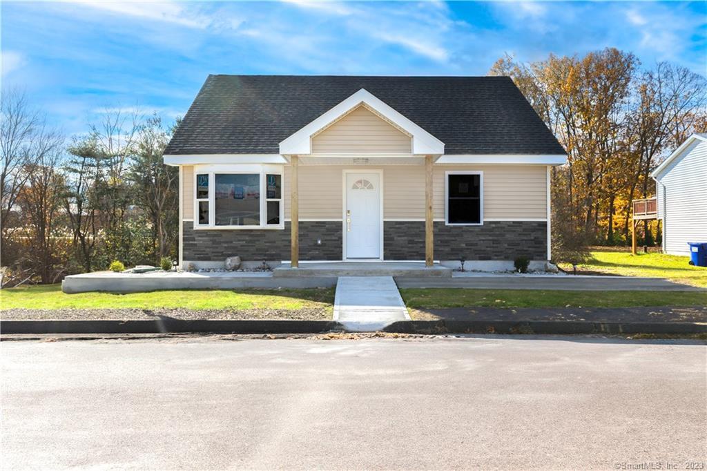 107 Northfield Road Wallingford, CT 06492 - Photo 1 of 1 a front view of a house with a yard