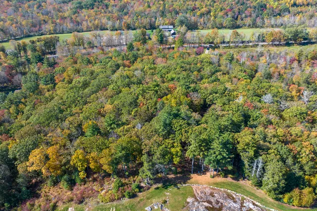 a view of a lake with a house