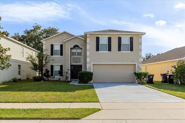 a front view of house with yard