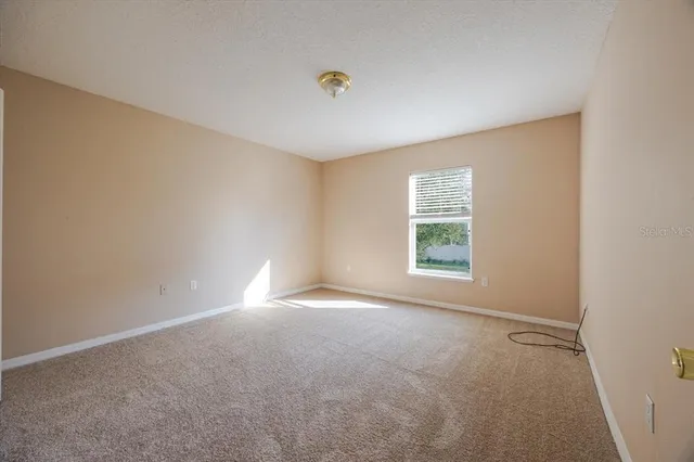 a view of empty room with window