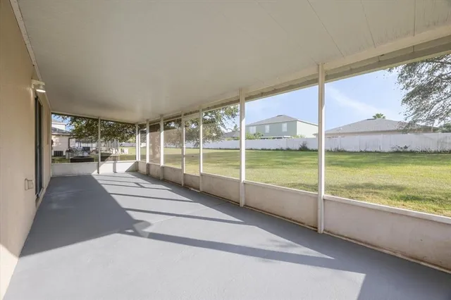 a view of a building from a floor to ceiling window