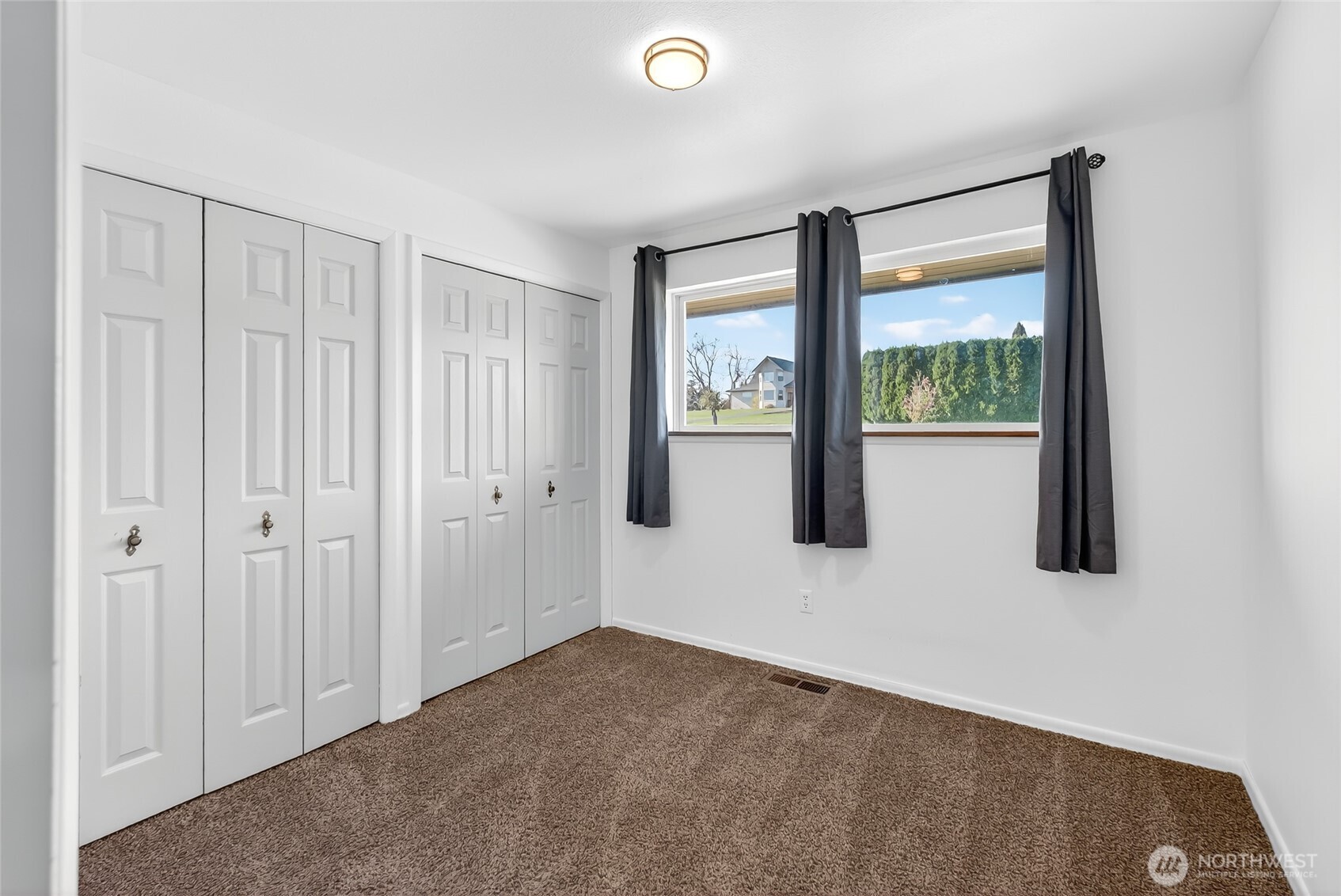2493 Hilltop Road Ferndale, WA 98248 - Photo 24 of 35 a view of an empty room with a window