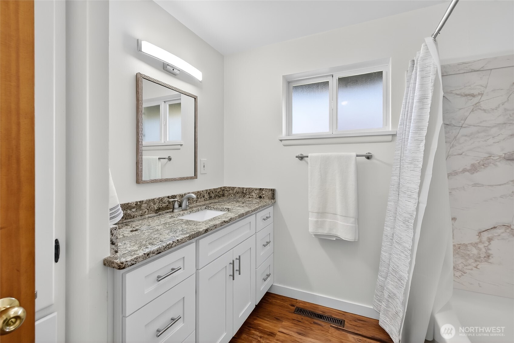 2493 Hilltop Road Ferndale, WA 98248 - Photo 25 of 35 a bathroom with a granite countertop sink and a mirror
