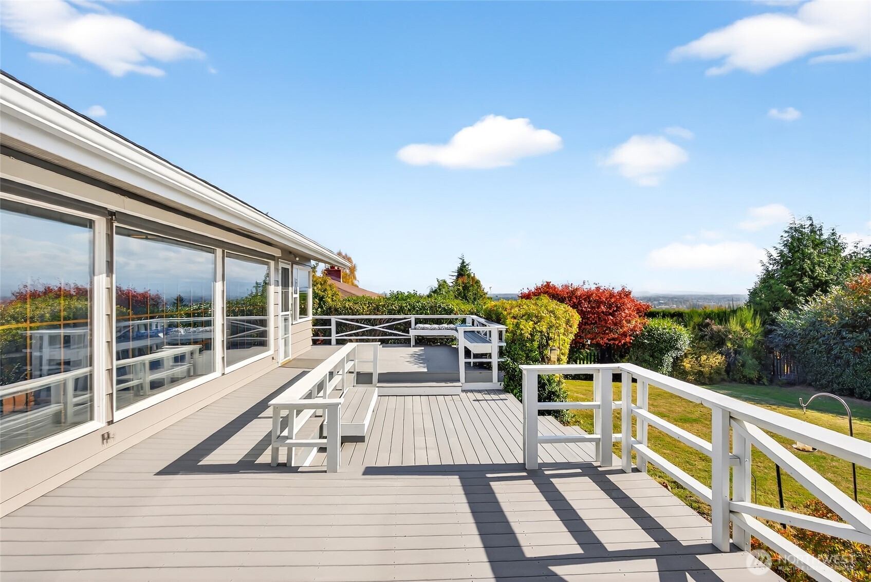2493 Hilltop Road Ferndale, WA 98248 - Photo 31 of 35 a view of balcony with wooden floor and outdoor seating