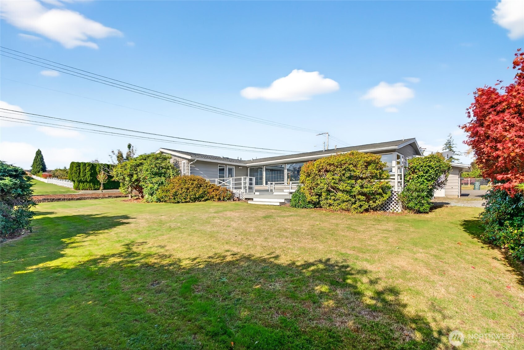 2493 Hilltop Road Ferndale, WA 98248 - Photo 33 of 35 a view of a house with a yard and potted plants