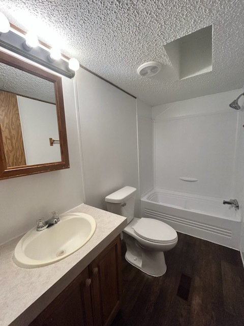 1600 Riverdale Road, Unit 75 Rock Falls, IL 61071 - Photo 13 of 17 a bathroom with a sink a toilet and a mirror