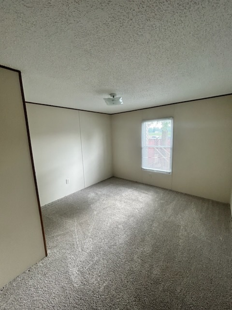 1600 Riverdale Road, Unit 75 Rock Falls, IL 61071 - Photo 10 of 17 an empty room with windows