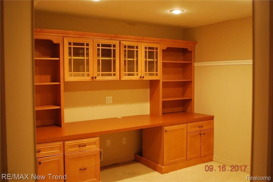 21680 River Ridge Trail, Unit 197 Farmington, MI 48335 - Photo 8 of 17 LOWER LEVEL OFFICE/LIBRARY