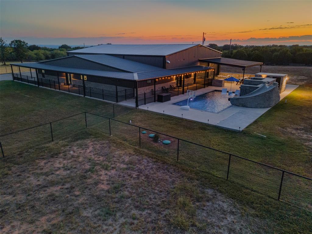 9700 Nix Road Tolar, TX 76476 - Photo 2 of 39 a view of a house with wooden deck