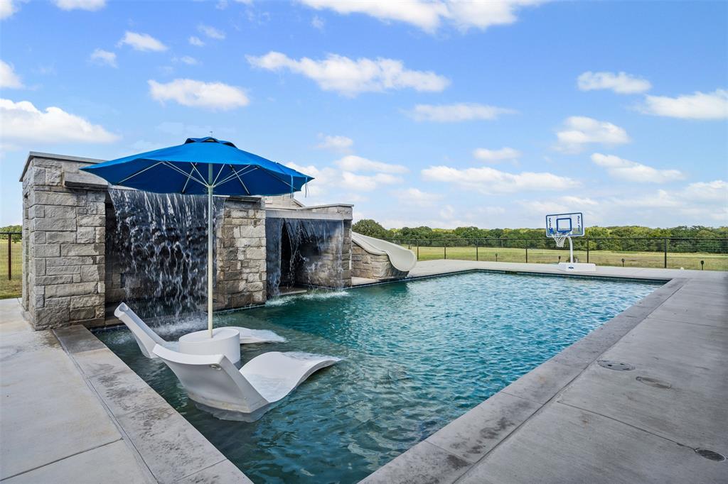 9700 Nix Road Tolar, TX 76476 - Photo 26 of 39 a view of a house with a yard and sitting area