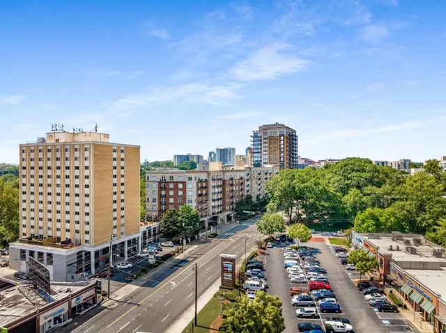 a view of city with tall buildings